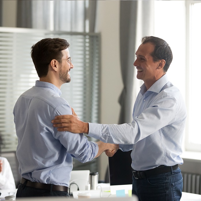 CEO Congratulating a top seller to sales manager