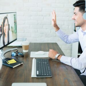 B2B salesperson selling via videoconferencing